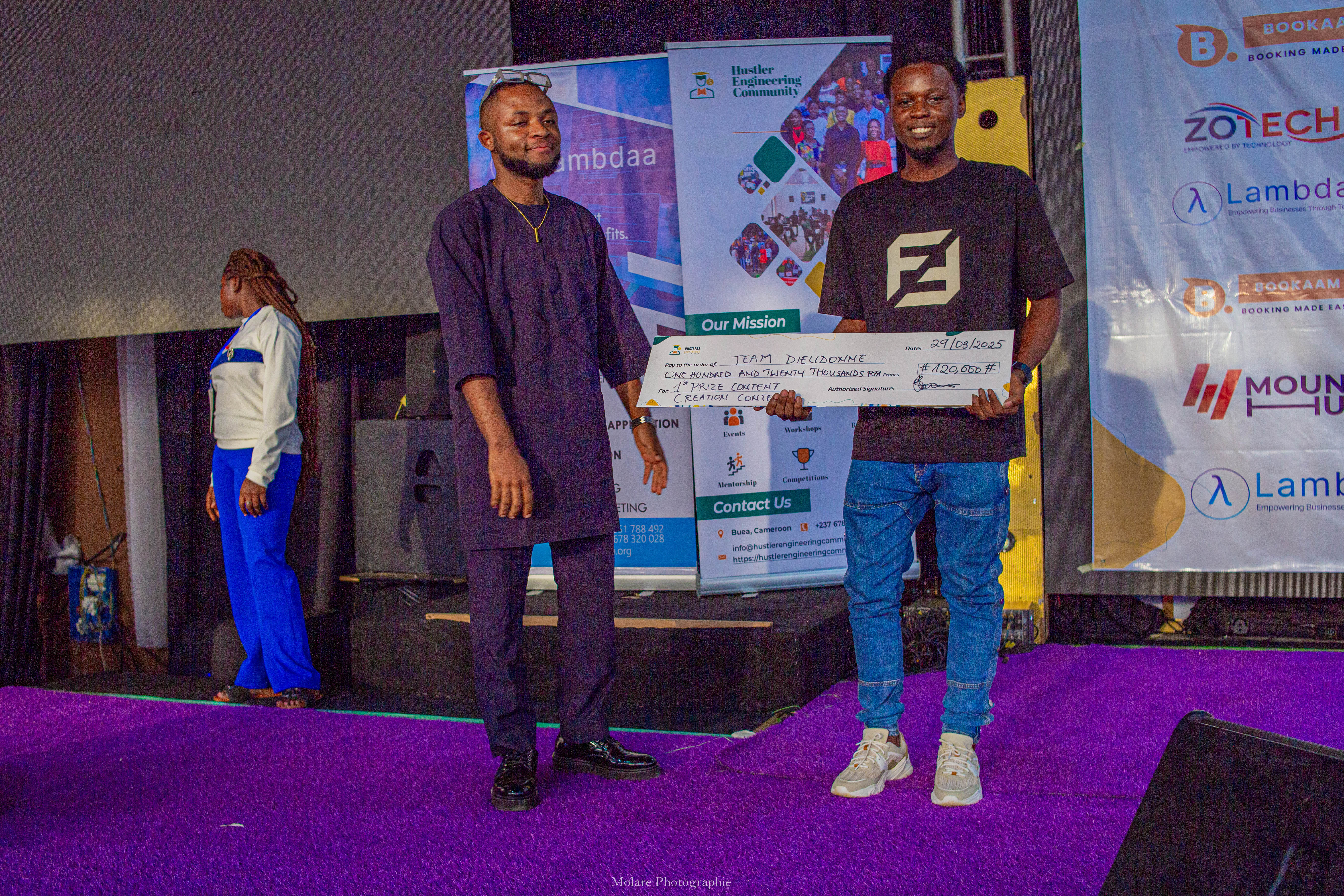 Team Dieudonne receiving first prize for the Content Creation Competition