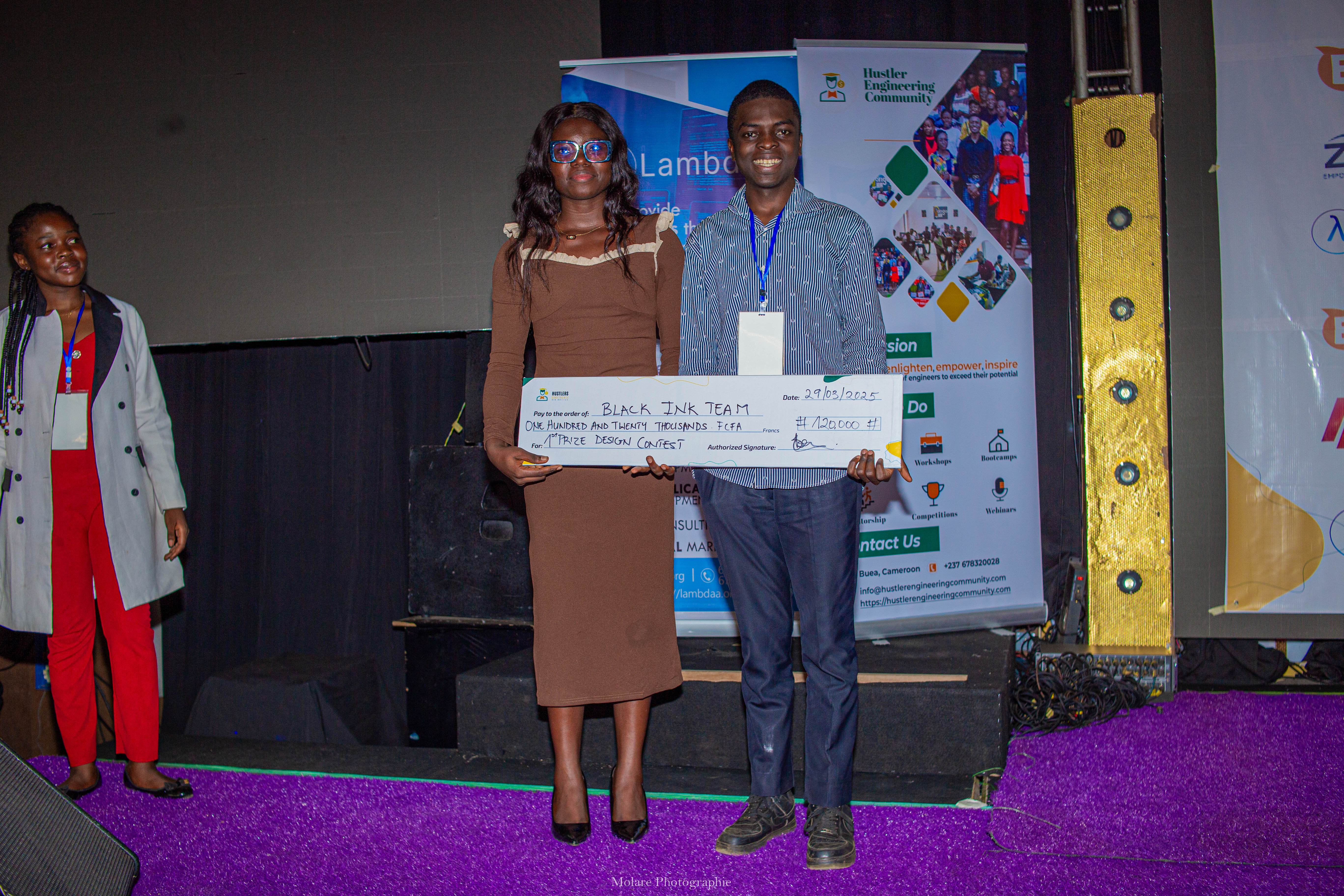 Black Ink Team receiving first prize for the Design Contest
