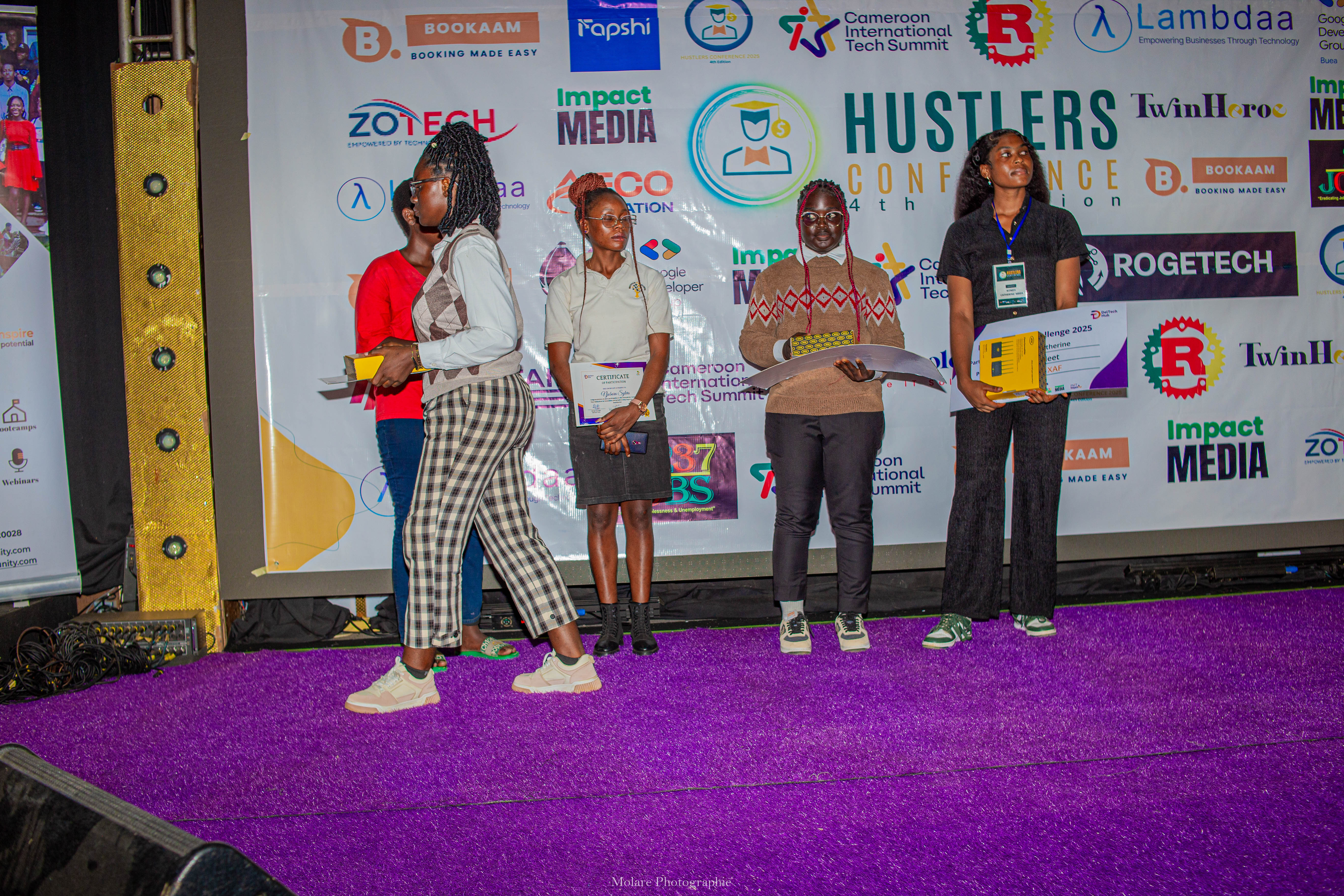 Design Challenge winners on stage at Hustlers Conference